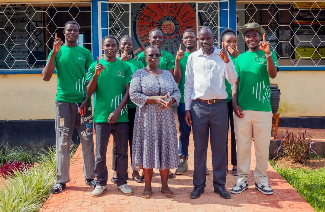 TTK team posing with school principal