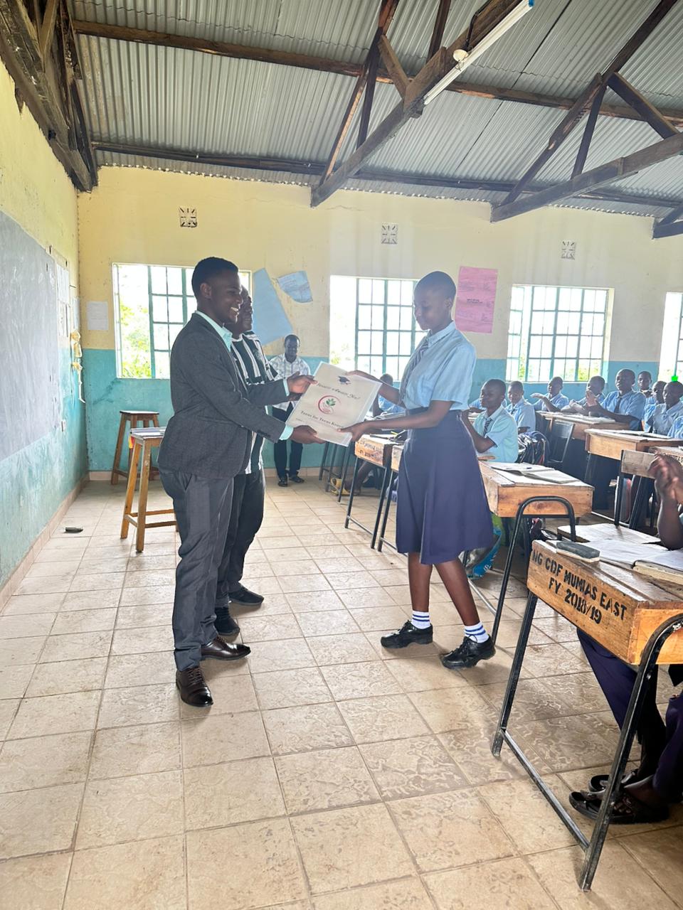 Girl receiving Success Card